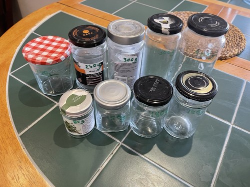 Collection empty glass jars - of,